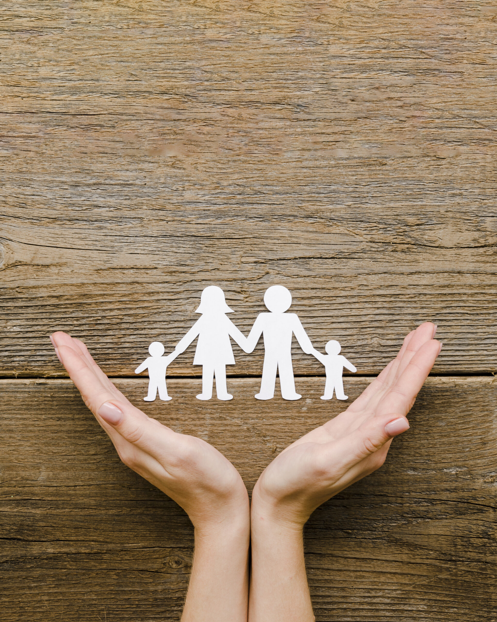 paper family composition wooden background with copy space